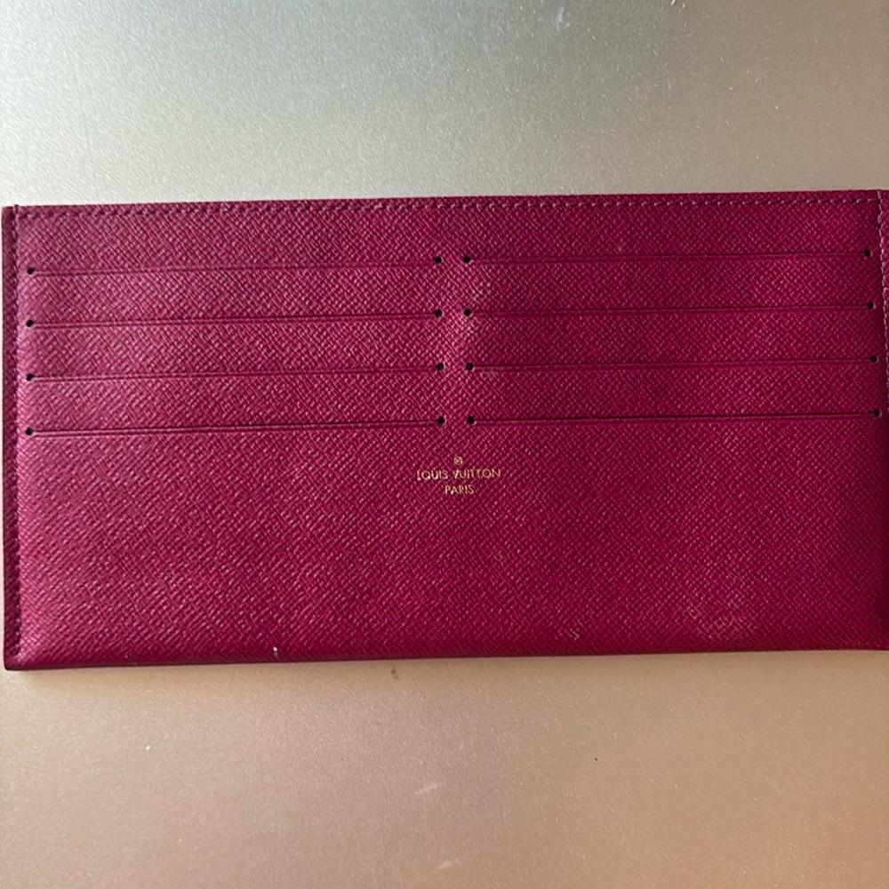 Light burgundy Louis Vuitton credit card holder